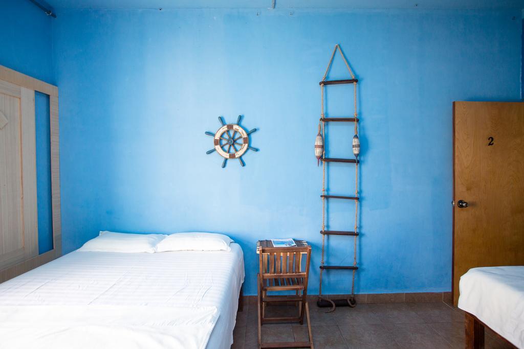 G.T. Guest House Garapan Quarto foto