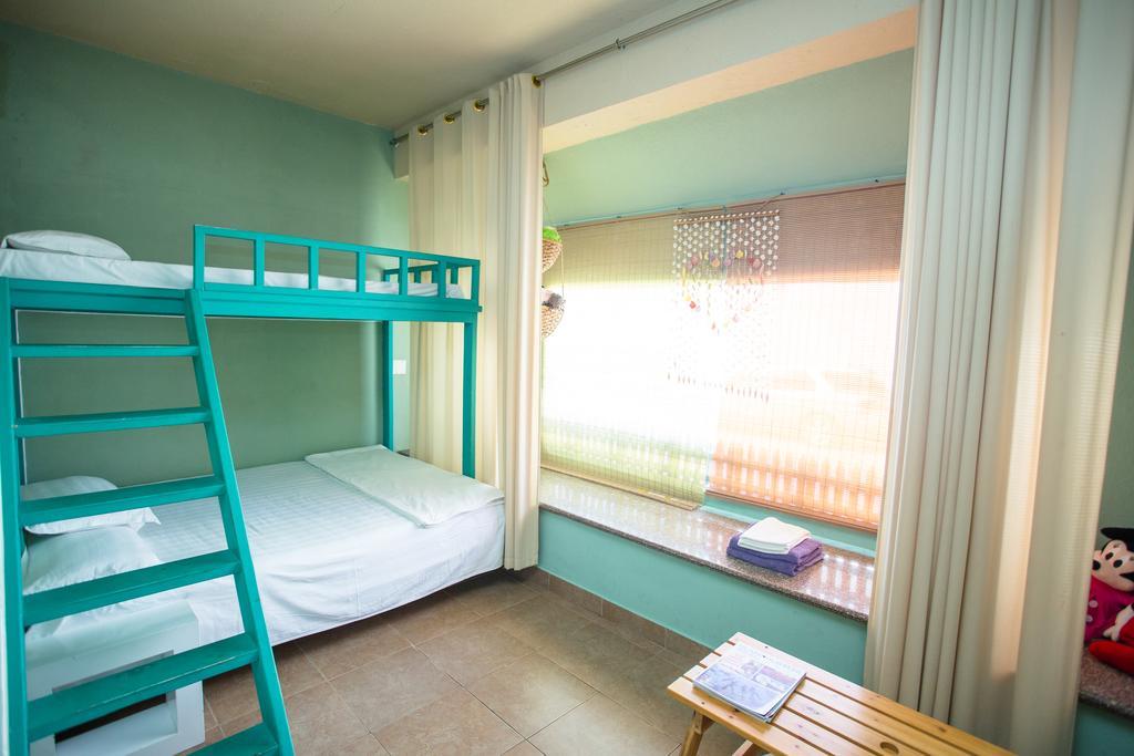G.T. Guest House Garapan Quarto foto