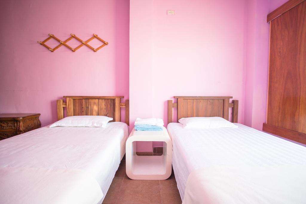 G.T. Guest House Garapan Quarto foto