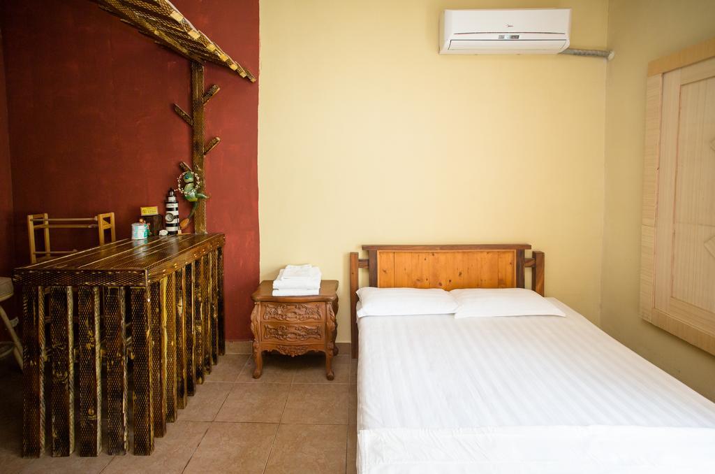 G.T. Guest House Garapan Quarto foto